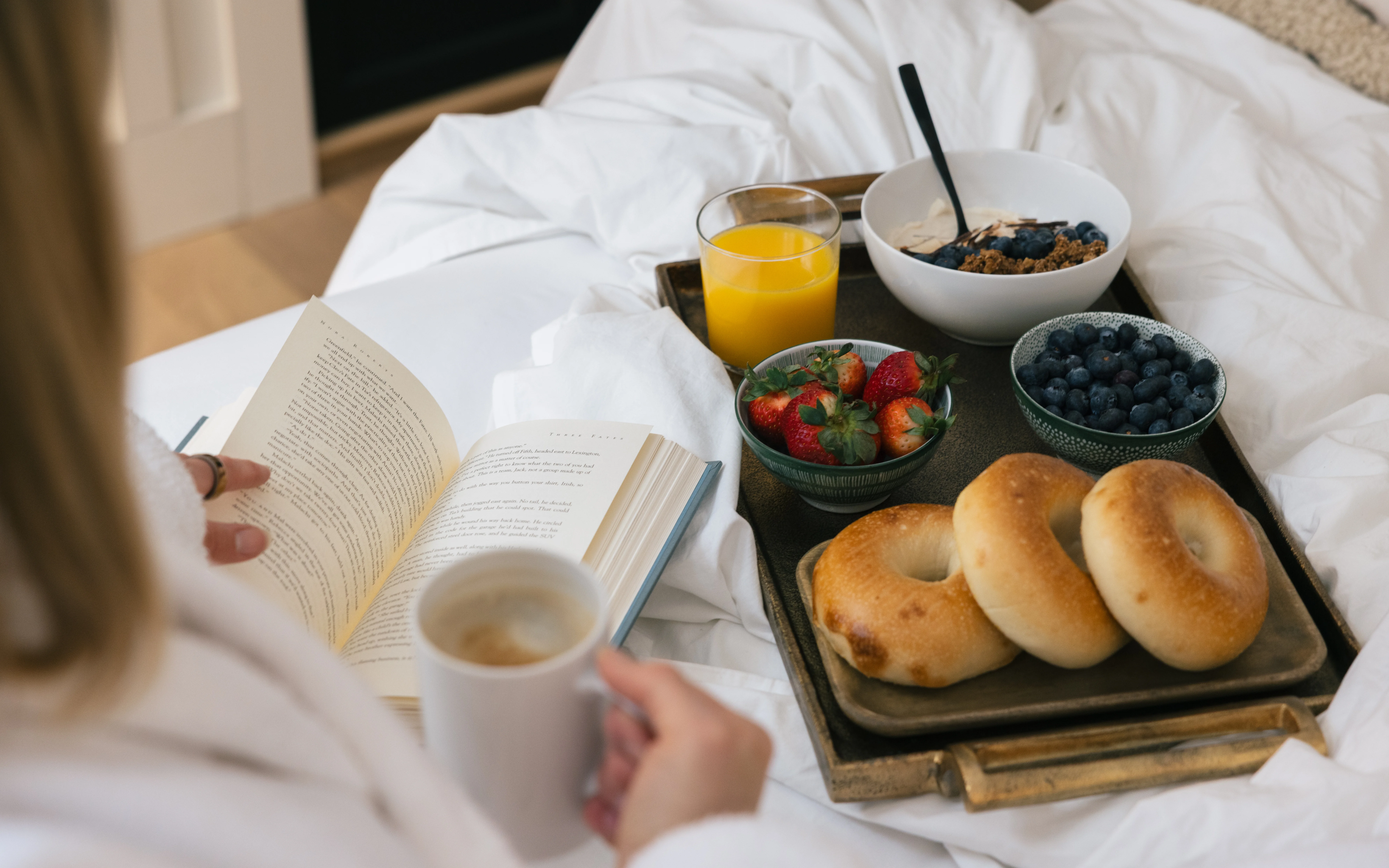 Leisurely breakfast in bed in the master suite with fresh pastries and morning coffee